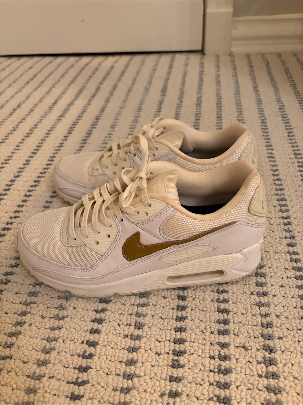 Nike Women’s Cream Sneakers with Gold Swoosh